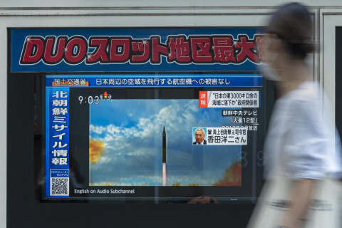 БНАСАУ-ын пуужин Японыг давж, тус улсад нүүлгэн шилжүүлэх анхааруулга өгчээ